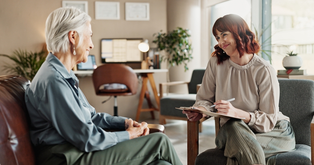 Psychologist Talking And Senior Woman